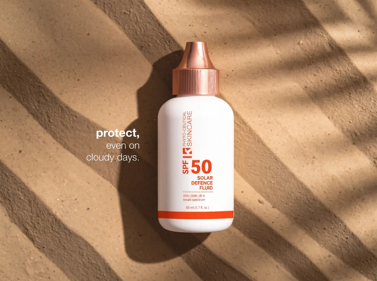 Solar Defence Fluid SPF 50 on sand: protect, even on cloudy days