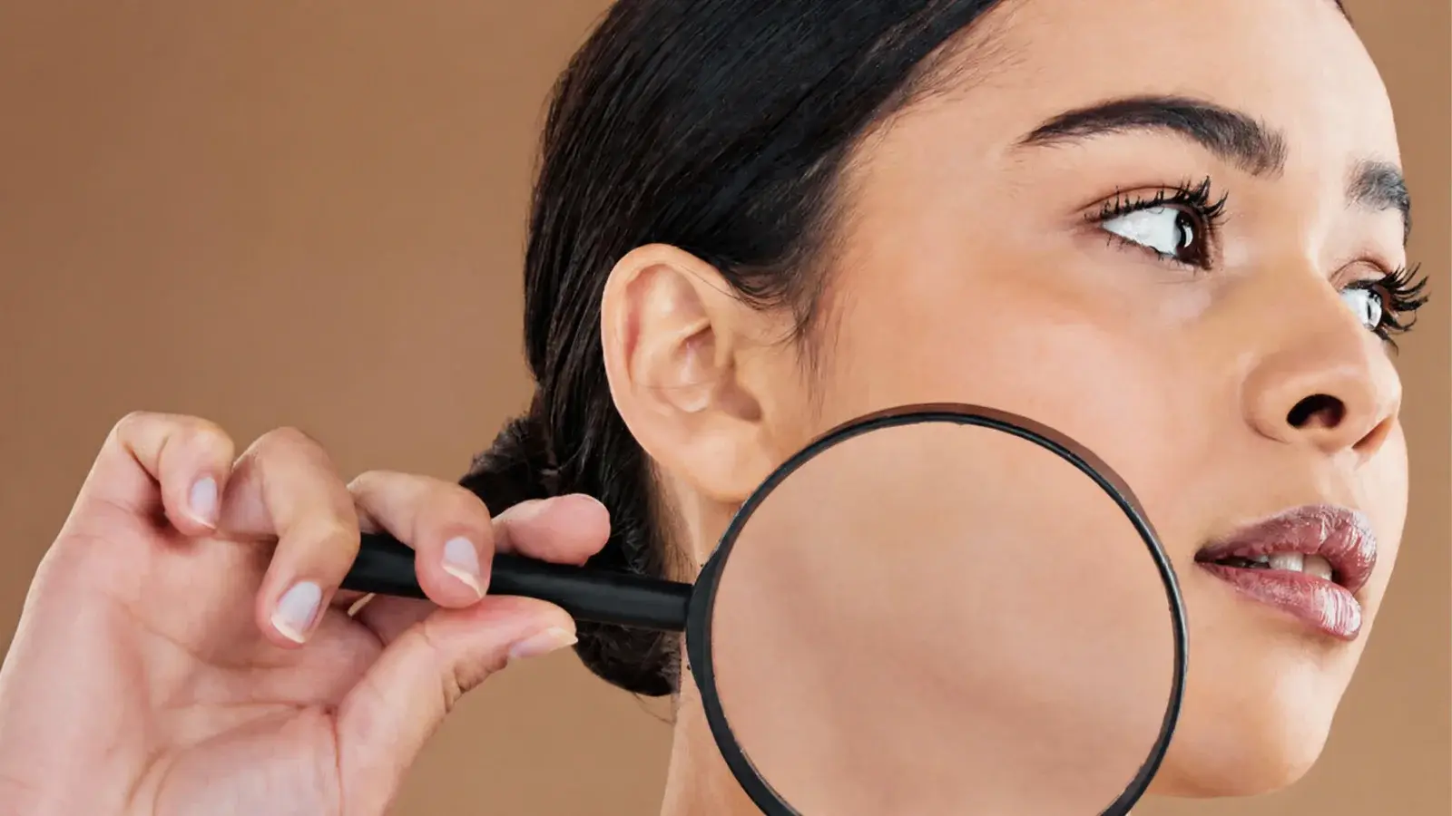 Magnifying glass on skin